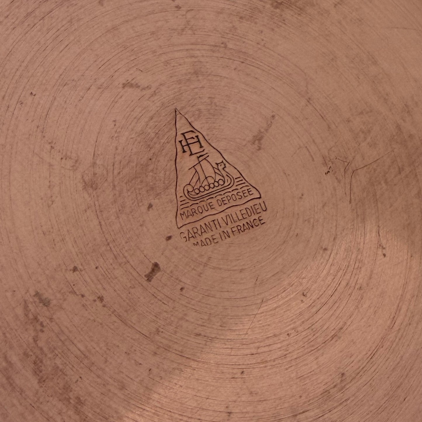 Maker's mark detail showing Villedieu French manufacture hallmark stamp