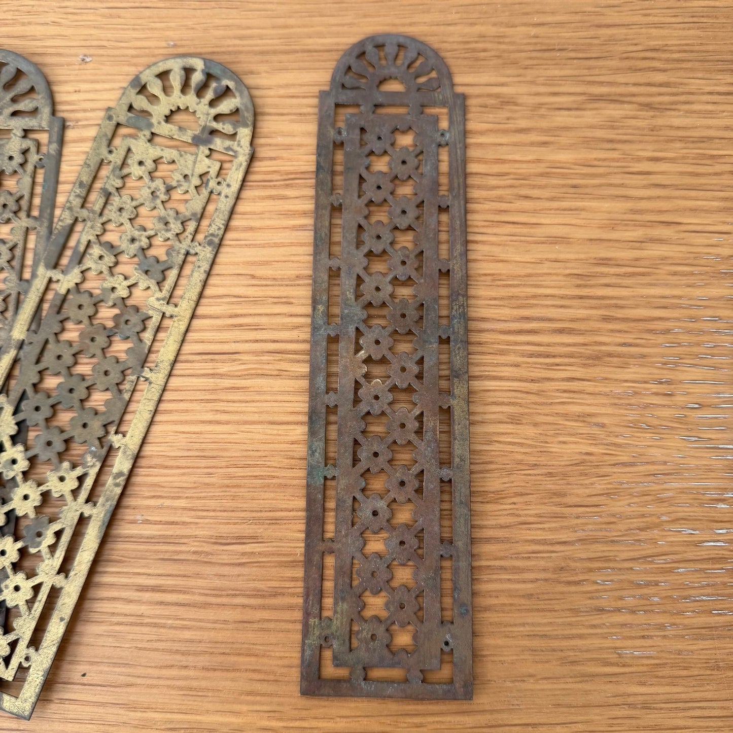 Collection of 5 authentic French Louis XVI style door plates with varying decorative patterns