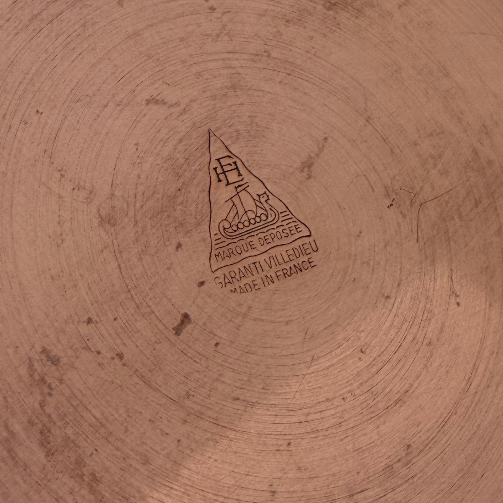 Maker's mark detail showing Villedieu French manufacture hallmark stamp