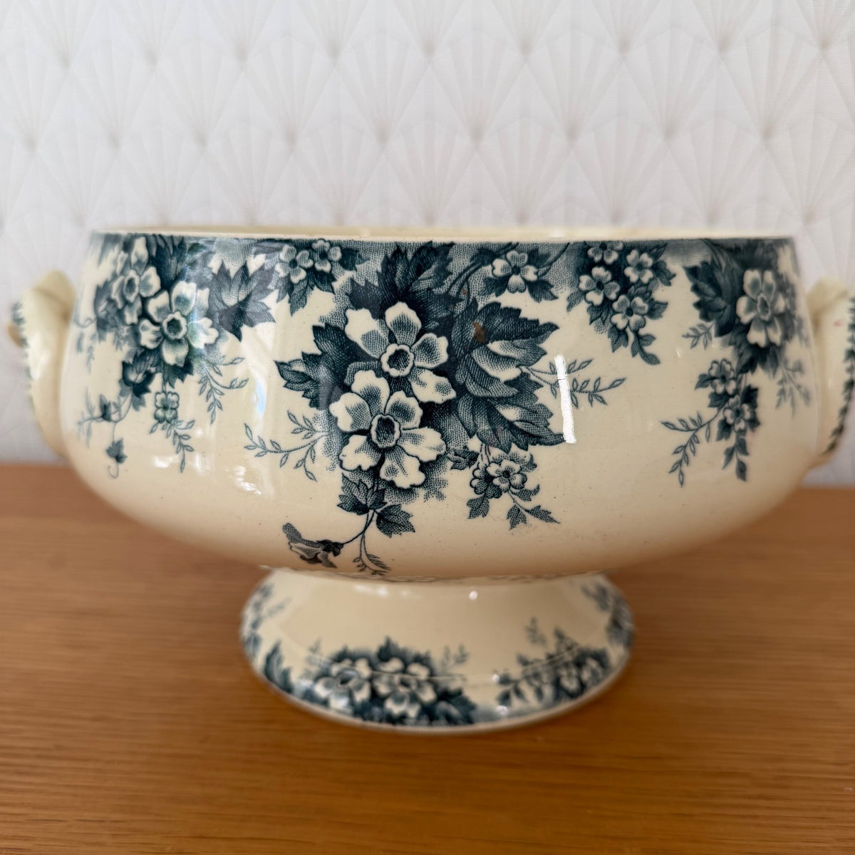 Top detail of French blue transferware tureen showing dense floral bouquet print on cream ironstone