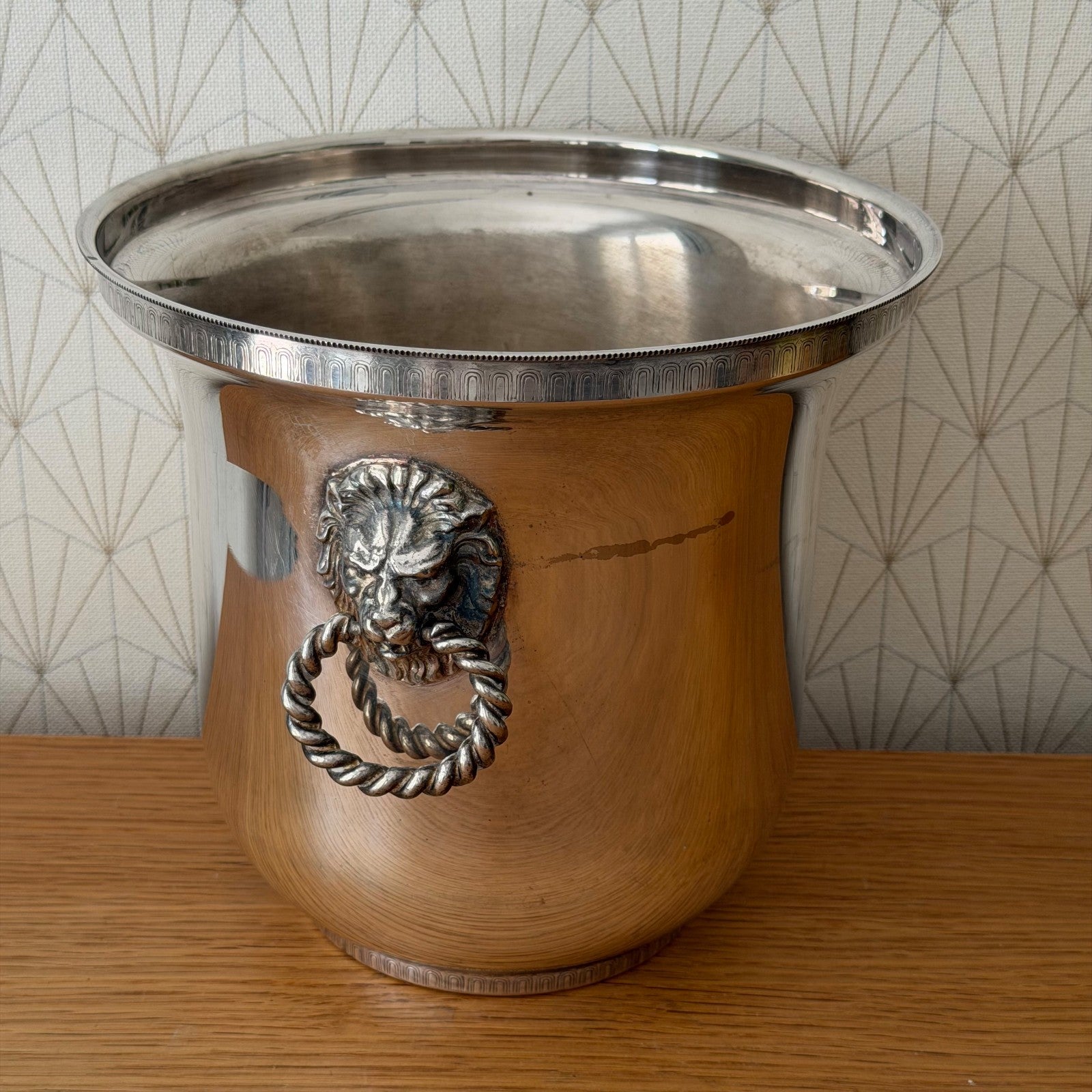 Polished interior of antique French champagne cooler with original silverplate