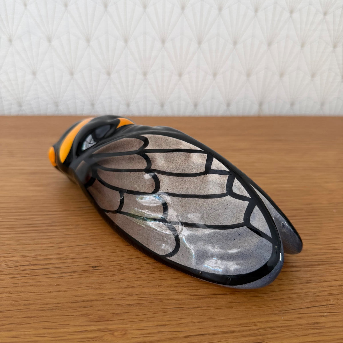 French majolica cicada pocket vase side view displaying sculptural wing pattern