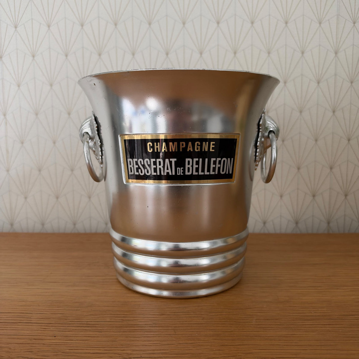 Vintage French champagne ice bucket with Besserat de Bellefon label and aluminum handles