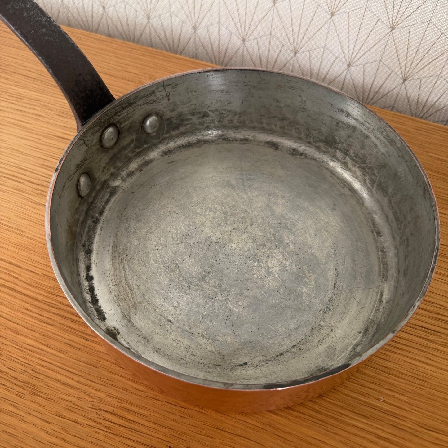 Detail of tin lining inside Gaillard Paris copper saute pan
