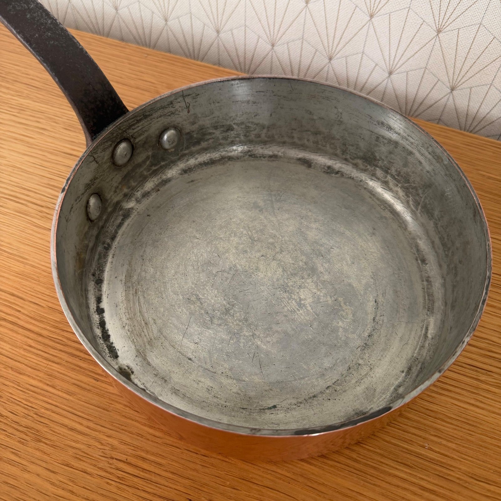 Detail of tin lining inside Gaillard Paris copper saute pan