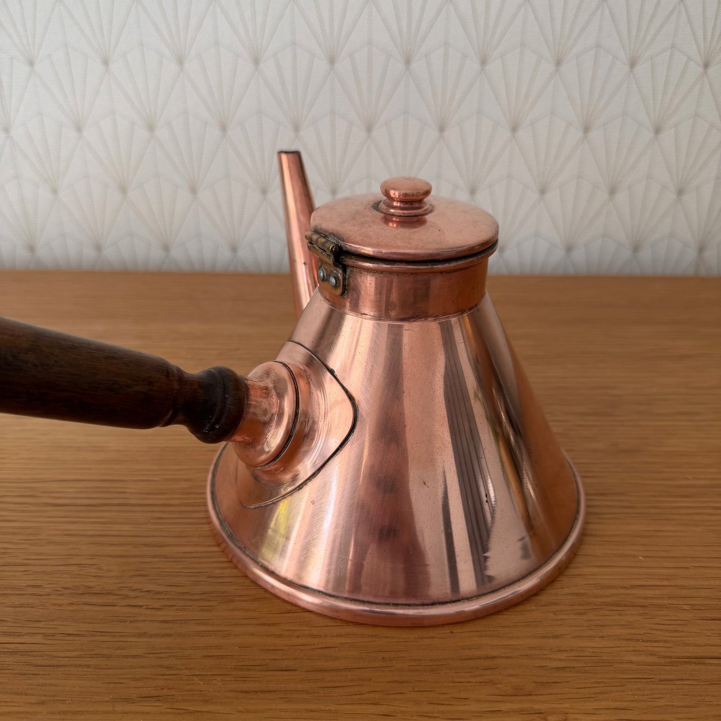 Top view of French copper cholatiere with maker's mark visible on base