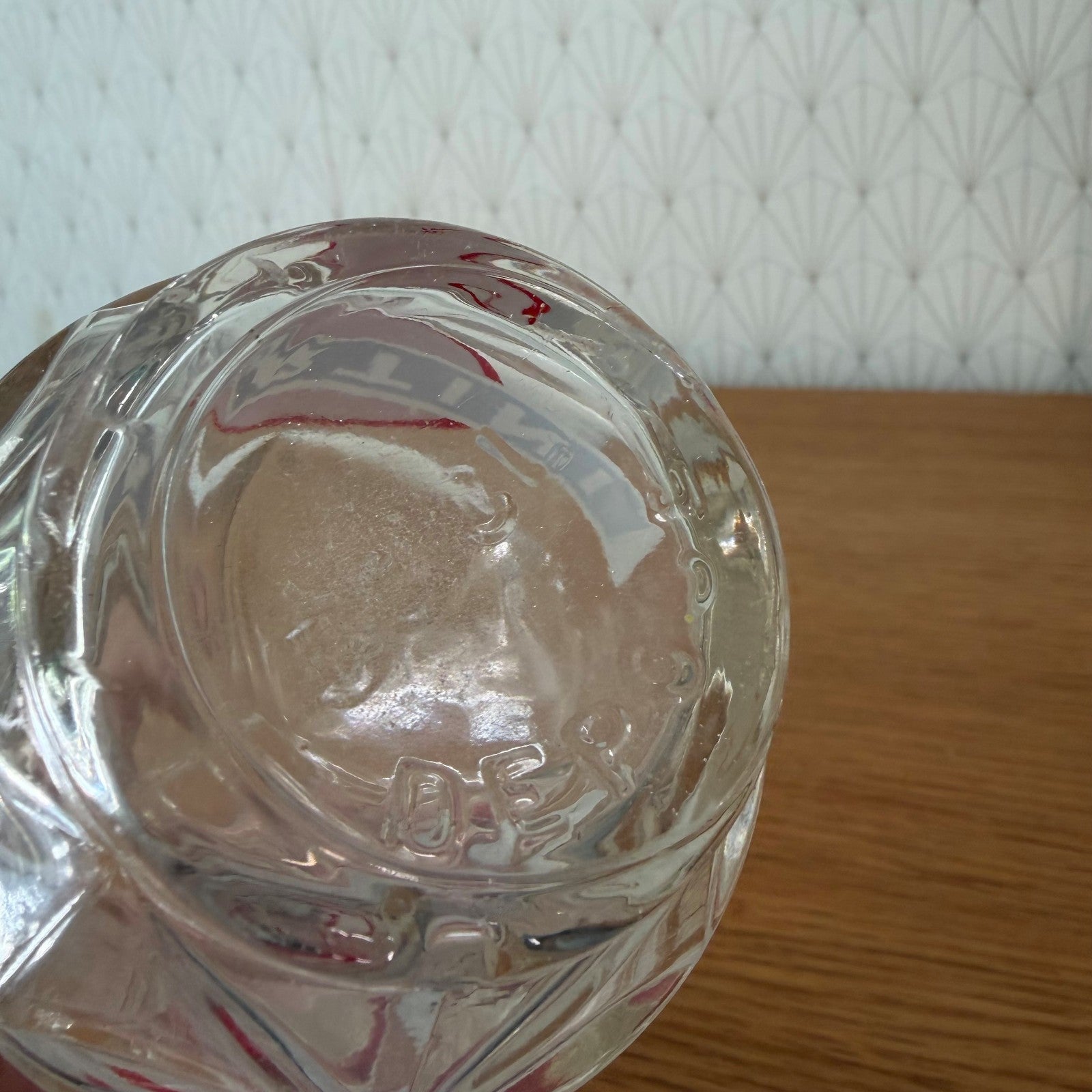 Close-up of Martini glass carafe mouth showing geometric cut-style moulded detail