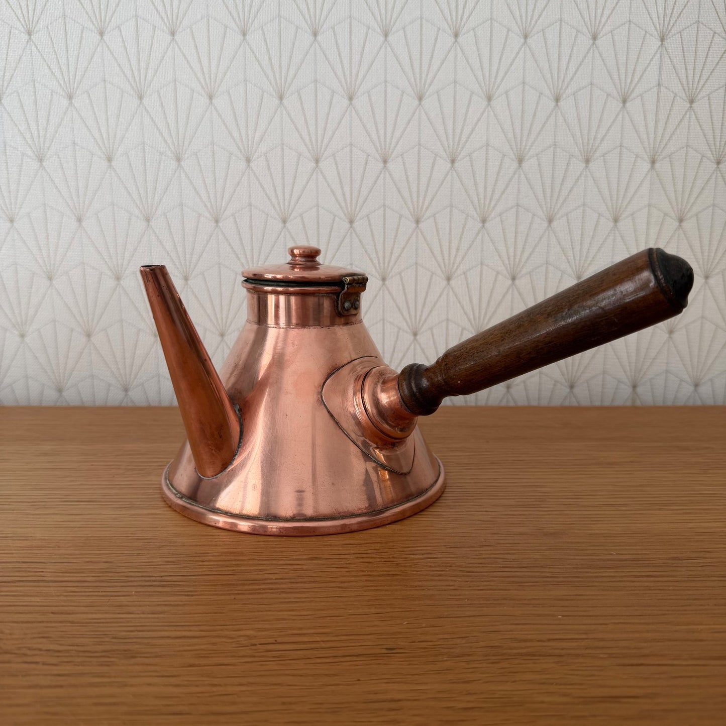French copper cholatiere with wooden handle, side view showing spout and lid