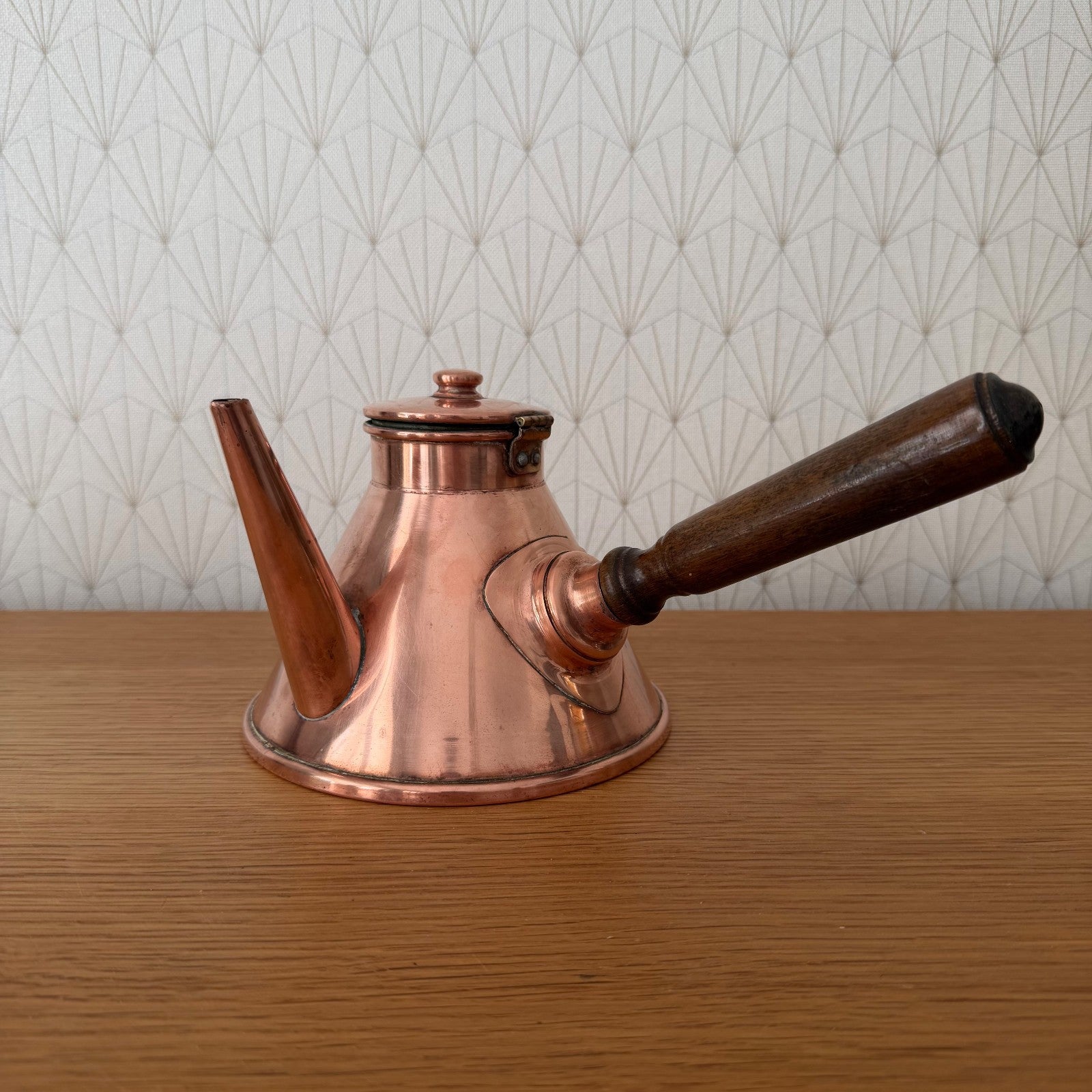 French copper cholatiere with wooden handle, side view showing spout and lid