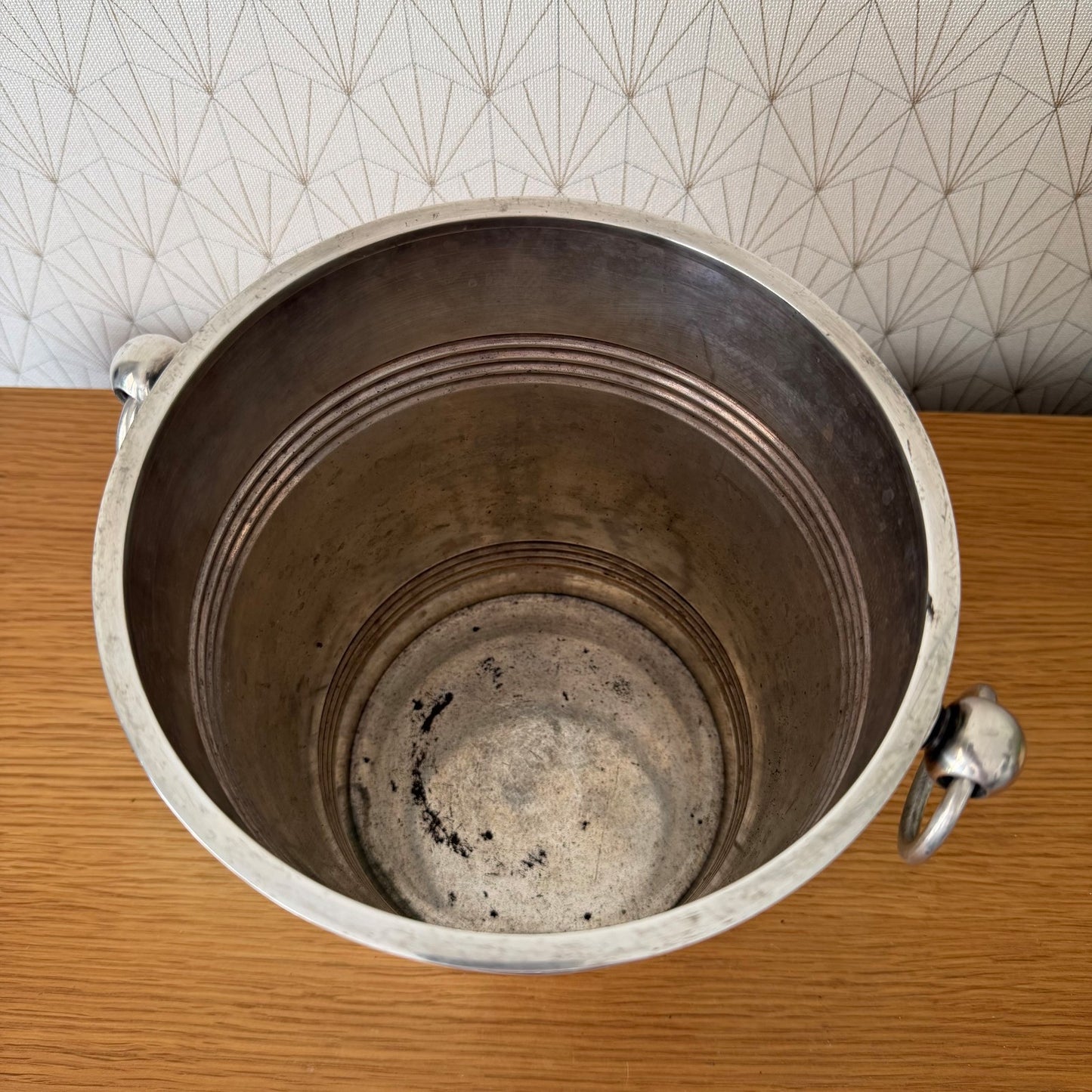 Interior view showing concentric grooved rings inside Christofle champagne bucket