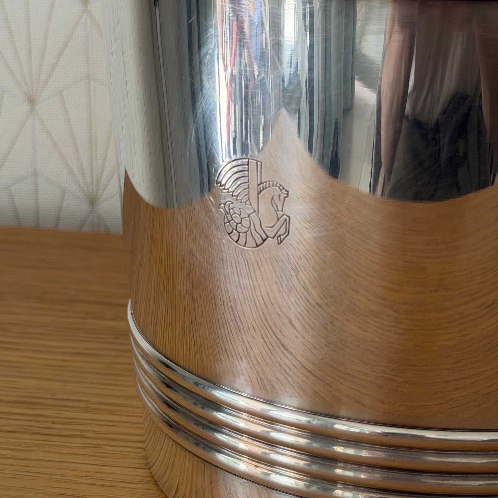 Close-up of engraved Air France monogram on Christofle champagne bucket body