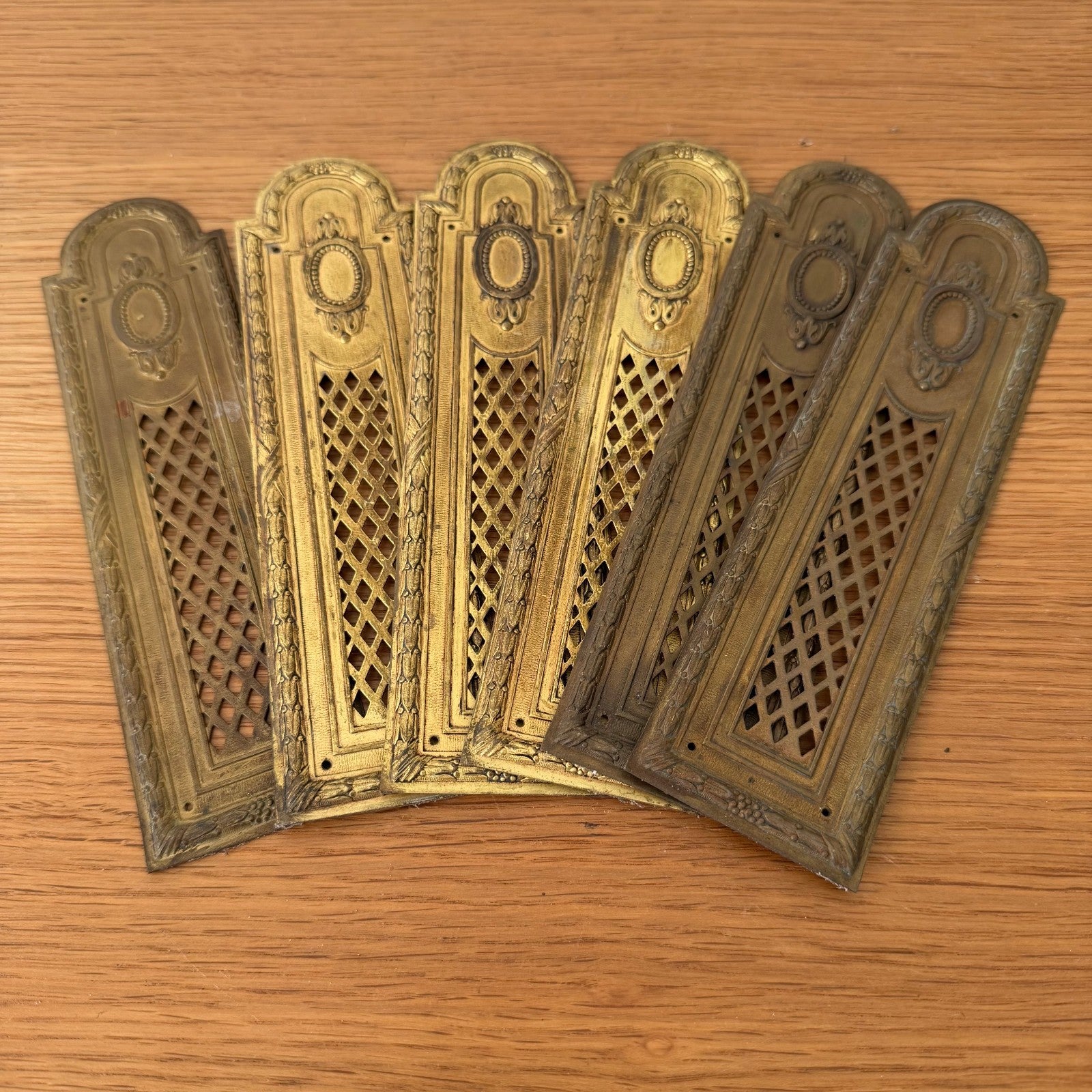 Single French vintage Louis XVI style door plate with arched top and lattice work pattern