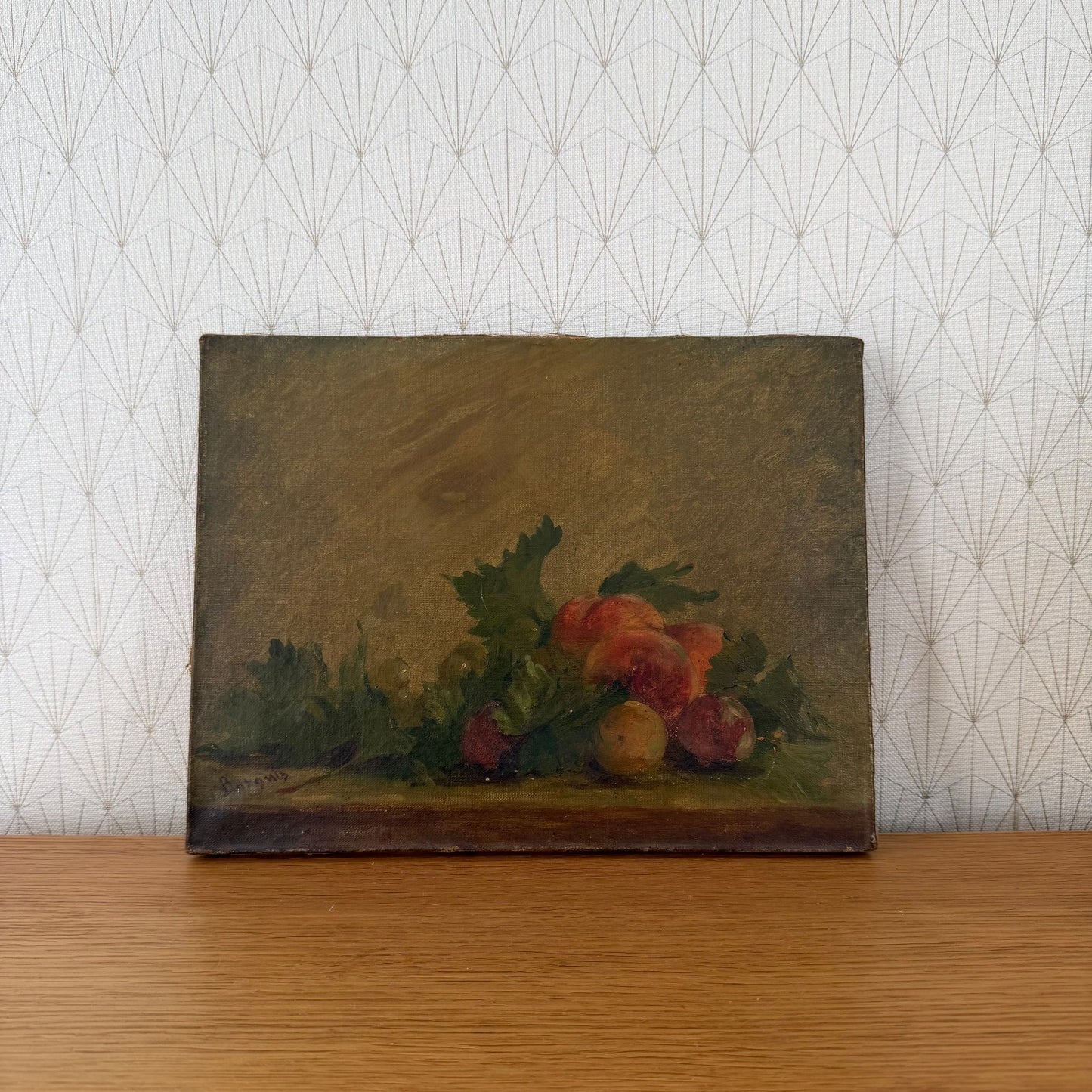 French antique still life oil painting with red peaches and green leaves on muted background