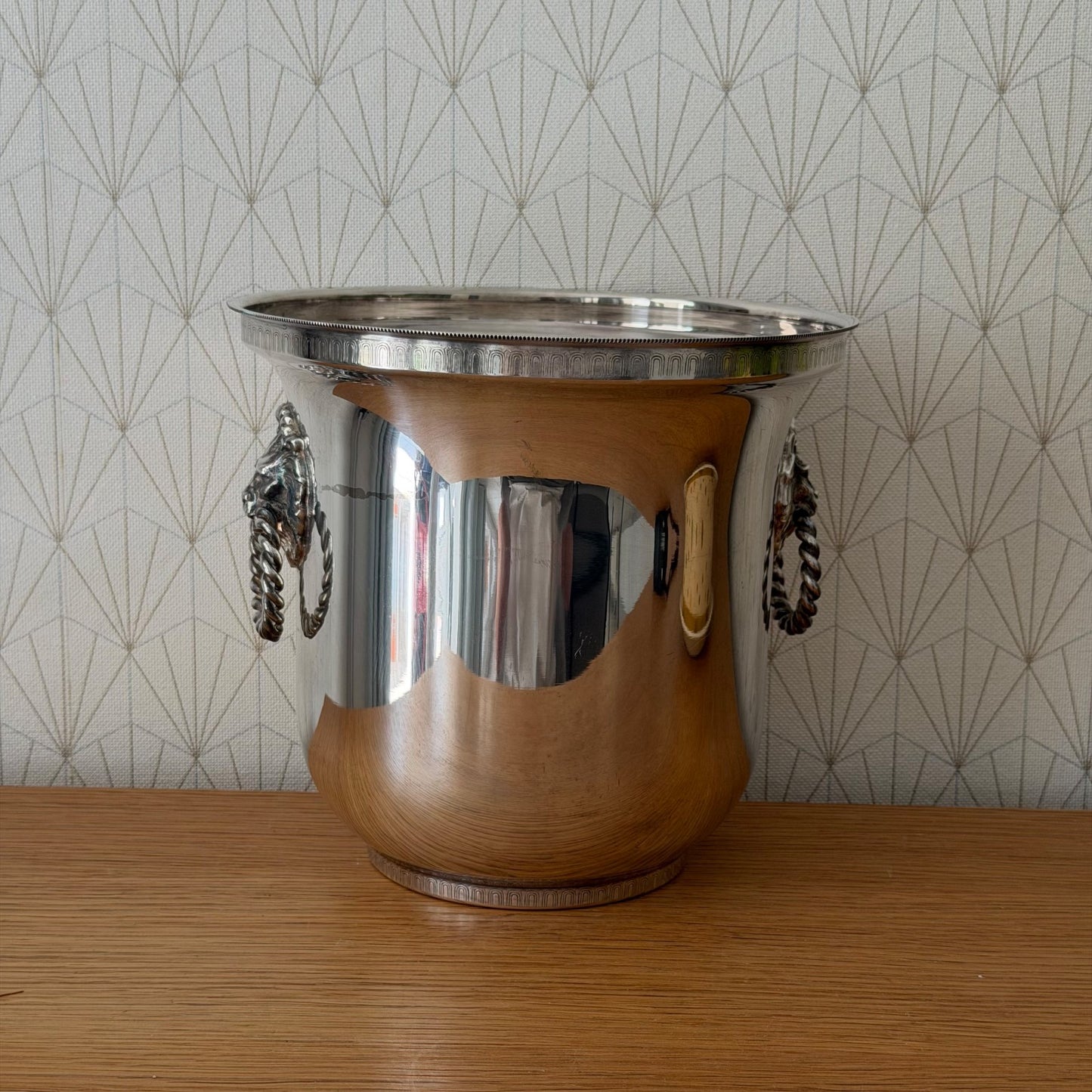 Top-down view showing flared rim and polished interior of French ice bucket