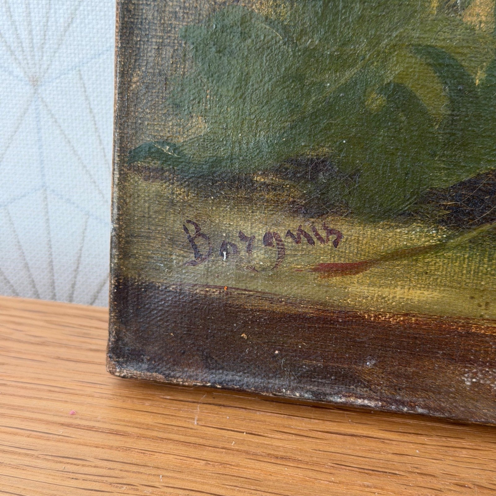 Edge view of French antique oil painting showing canvas stretcher and age patina
