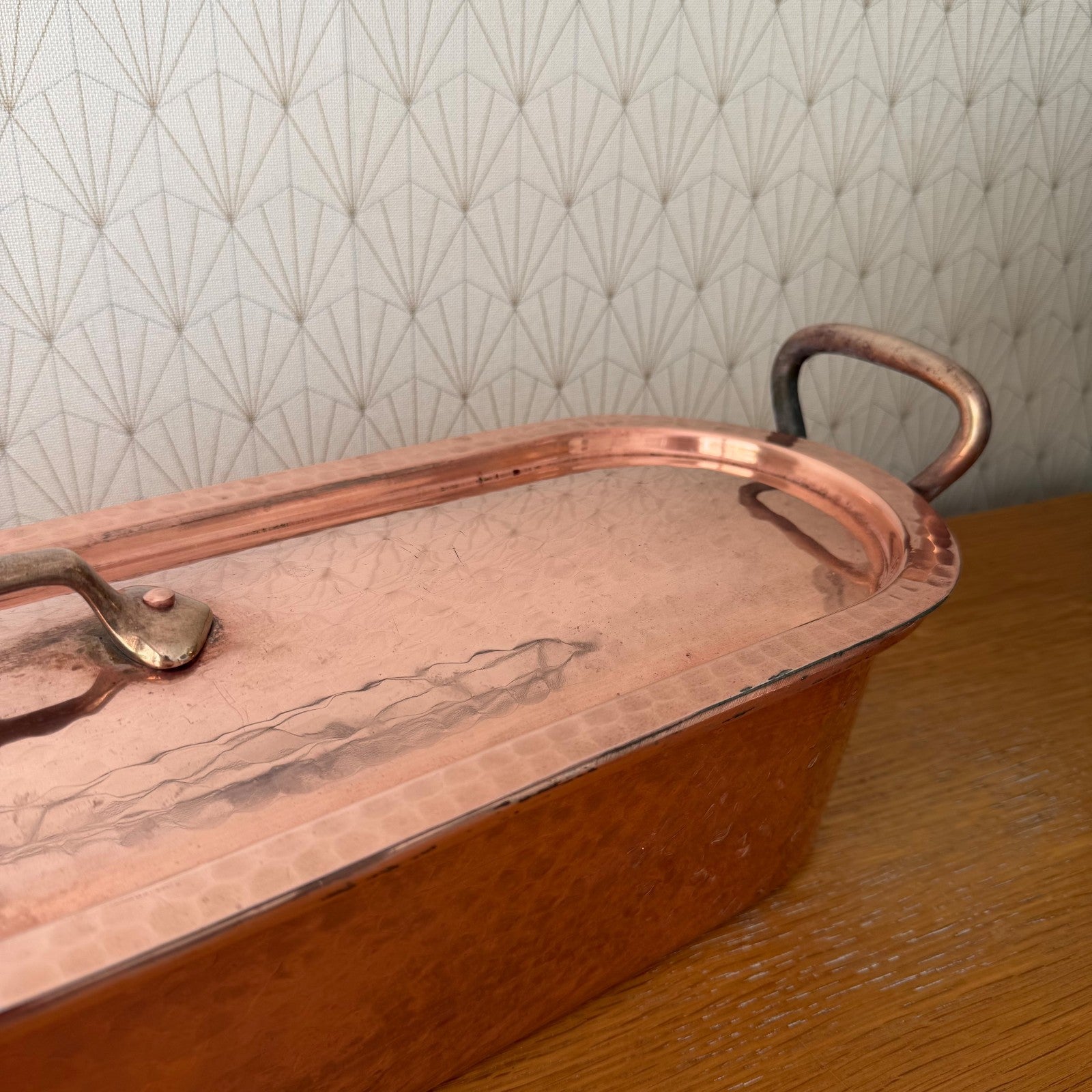 Hand-hammered copper surface detail showing craftmanship of Villedieu kettle