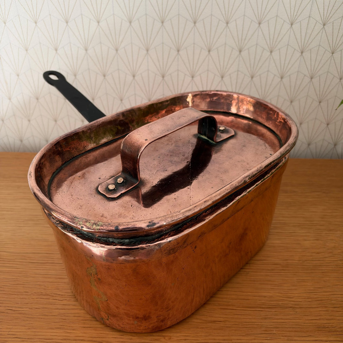 Top view of 19th-century French copper braisiere showing original lid with copper handle detail