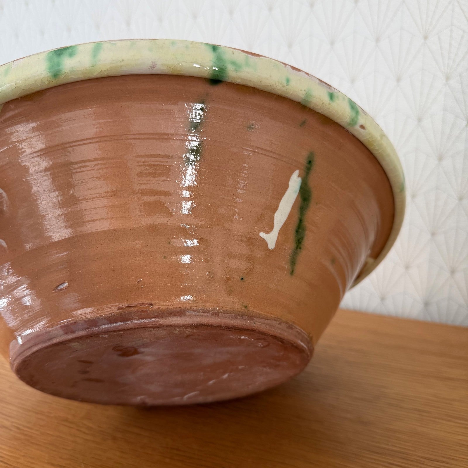 French terracotta pottery bowl exterior showing natural clay body and wheel-thrown ridges