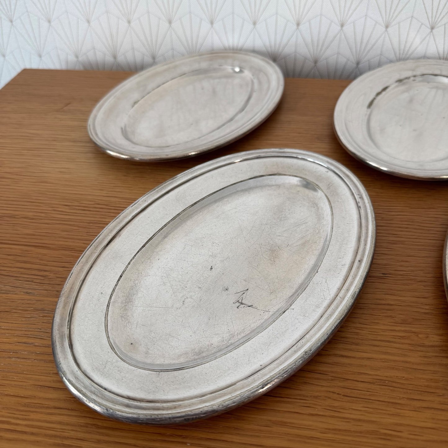 Close-up of single French Ercuis silver plated oval tray showing stepped rim and recessed well detail