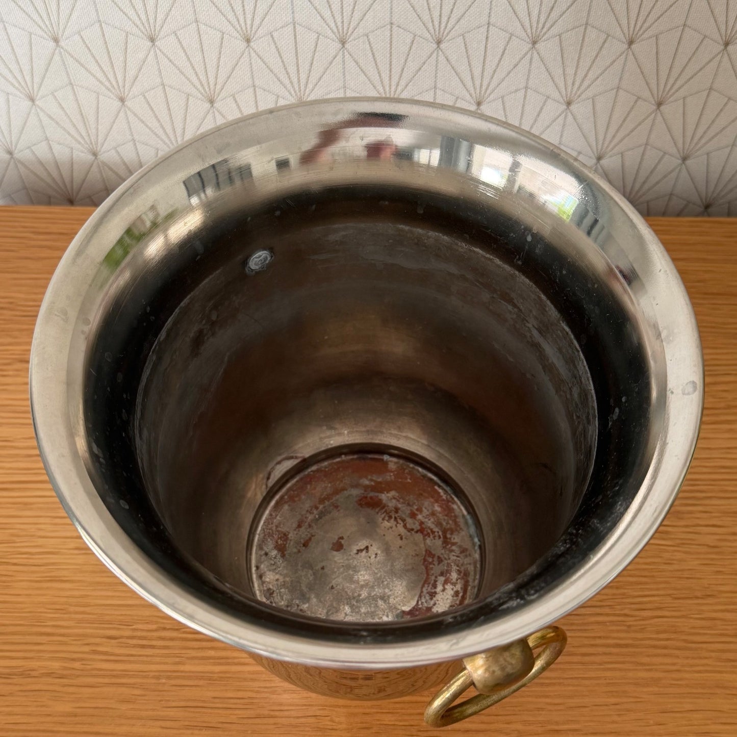 Interior view of ice bucket showing wear consistent with professional use