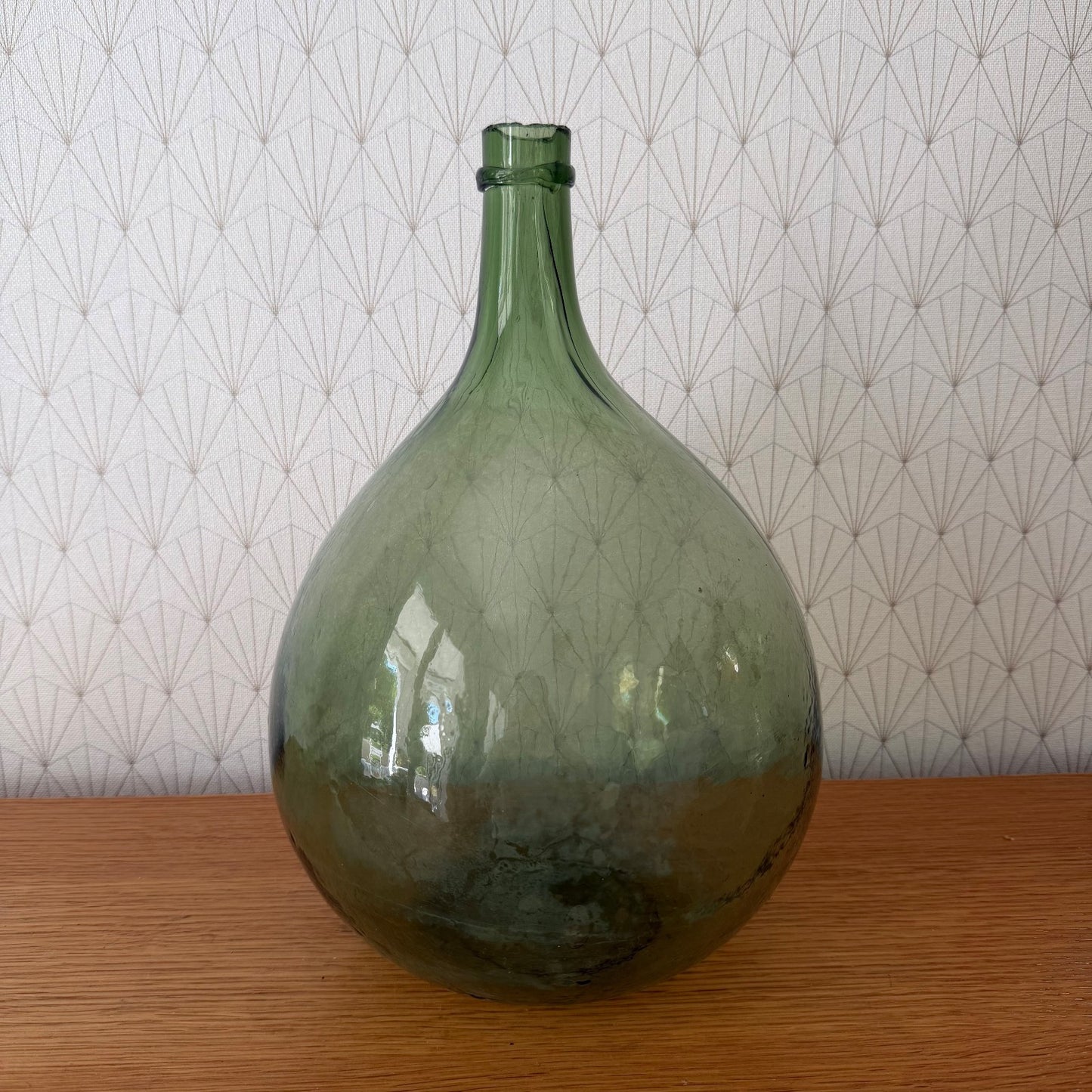 Antique French Dame Jeanne green glass demijohn bottle, side profile