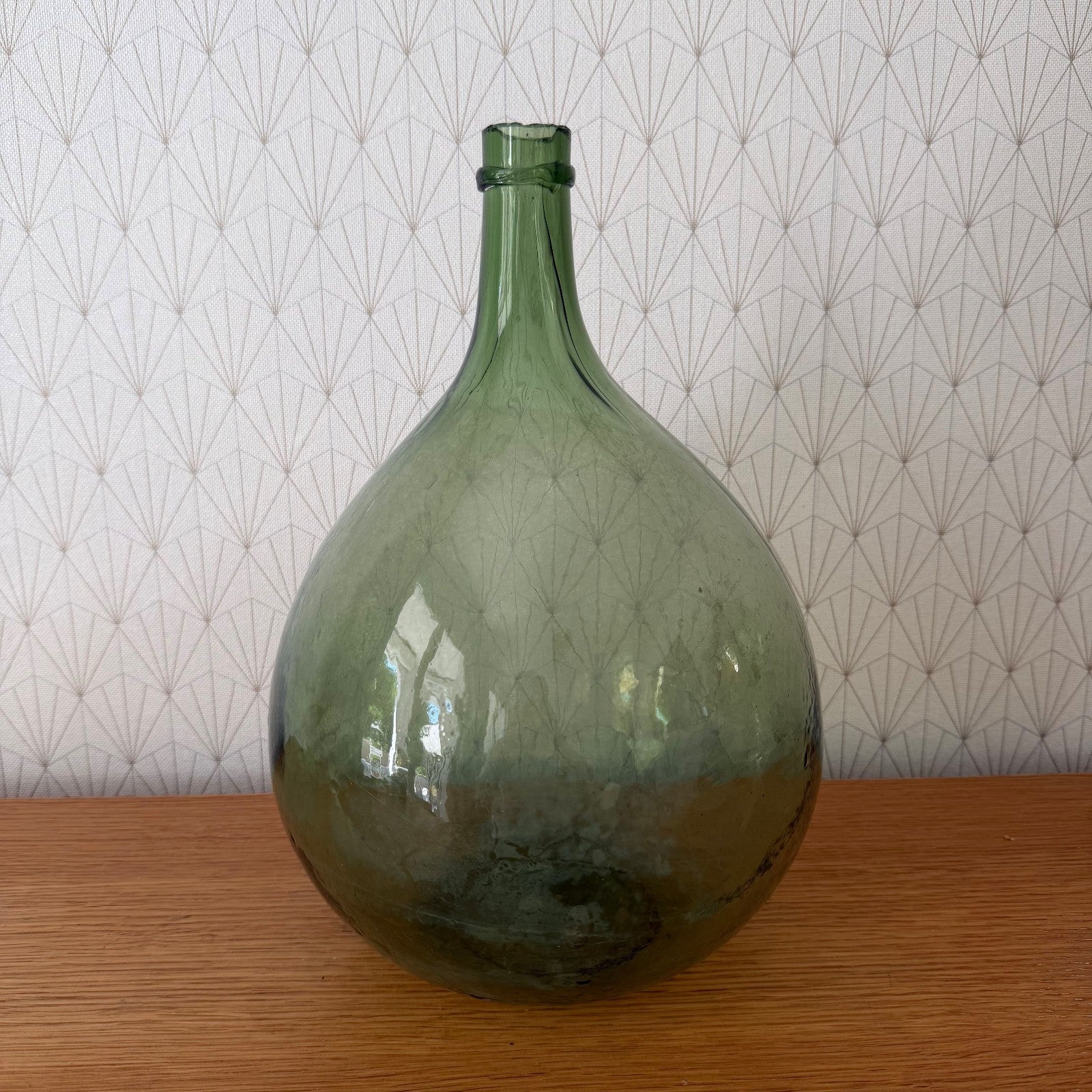 Antique French Dame Jeanne green glass demijohn bottle, side profile