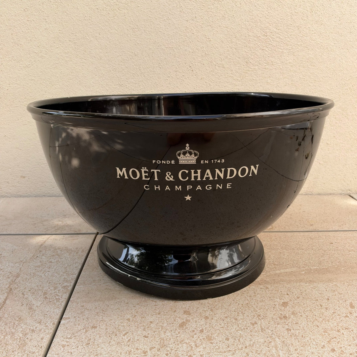 Top view of Moet Chandon champagne bucket showing wide opening and mirror-like finish