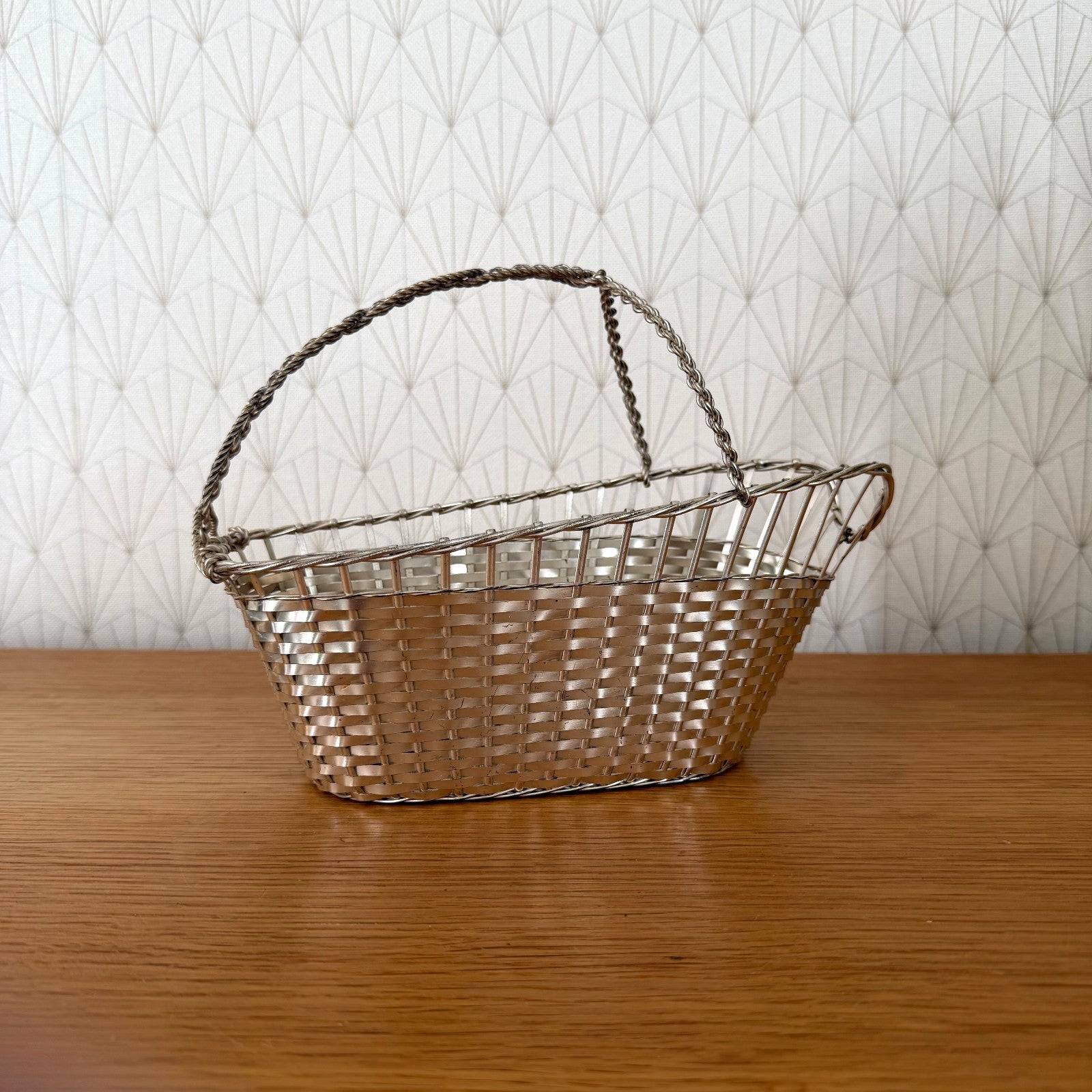 French silver plated wine basket with twisted rope handle, front view