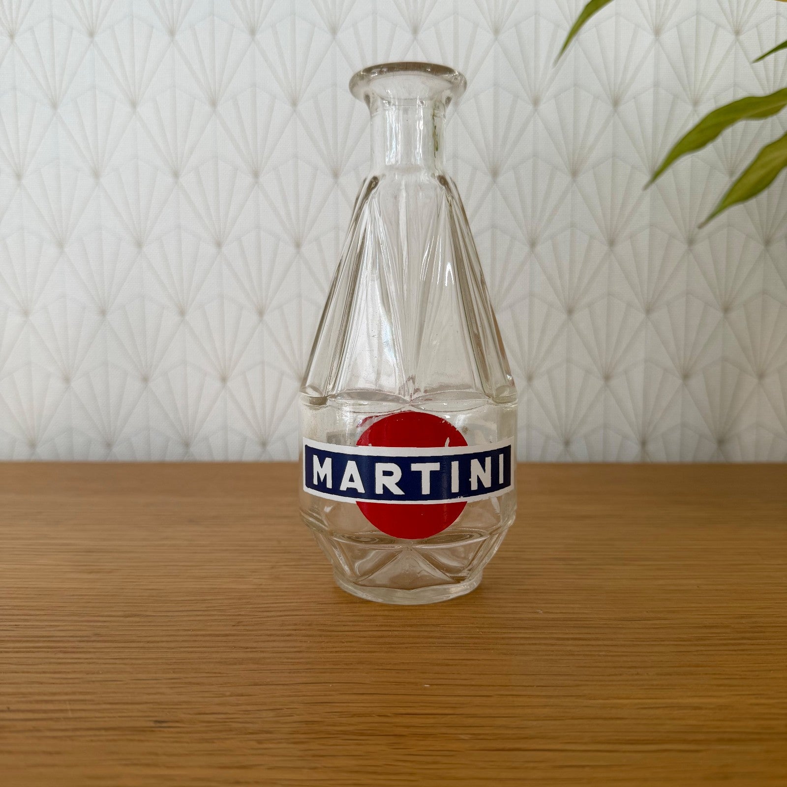 Vintage Martini glass carafe 33cl with red and navy branded label, geometric faceted base