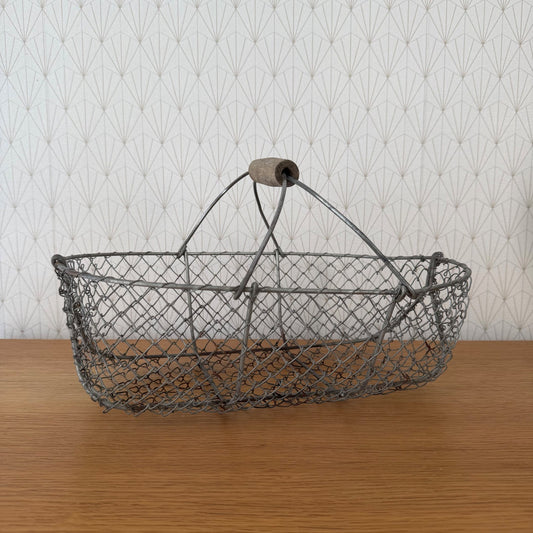 Vintage French wire harvesting basket with wooden handle, full view