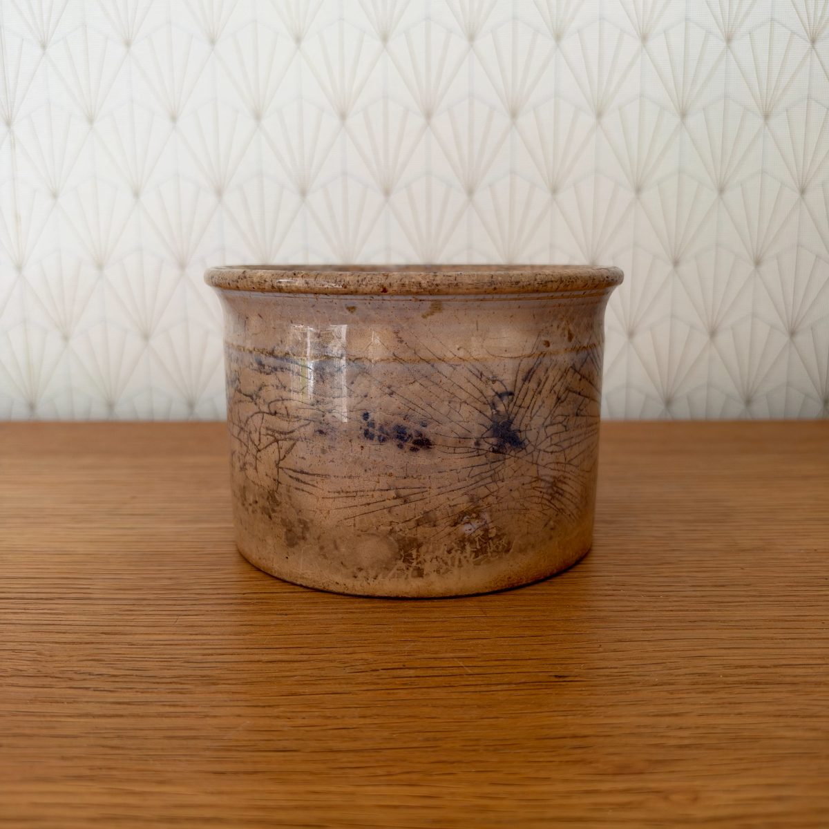 Second side view of antique French Sarreguemines stoneware crock showing blue-grey splashed glaze decoration.