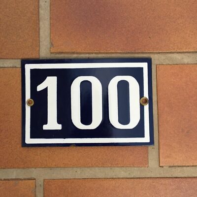 Vintage French enamel house number 100 plaque, navy blue background with white numerals and white border, metal 10x15cm
