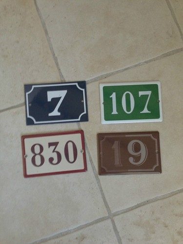 Rectangular French municipal enamel house number plaque with white numerals on navy blue vitreous enamel steel backing, mid-20th century, 10x15cm, showing authentic vintage weathering.